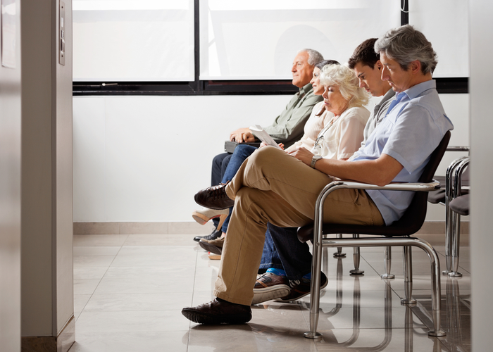 Patients waiting in a clinic waiting room, highlighting the convenience of virtual care